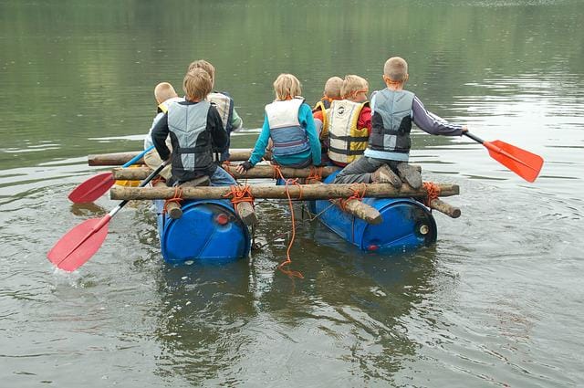 Children on homemade raft